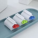 3 Pcs Toothpaste Tube Squeezer Plastic Rotating Toothpaste Dispenser Seat Holder for Paints Cosmetics Cream