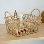 Handwoven paper rope storage basket with a rectangular design and two handles; perfect for organizing desk clutter, snacks, and cosmetics; Bohemian-style storage basket